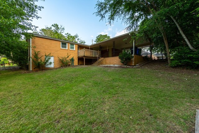3068 Apache Dr, Columbus, GA 31909 - rear view of property with a yard