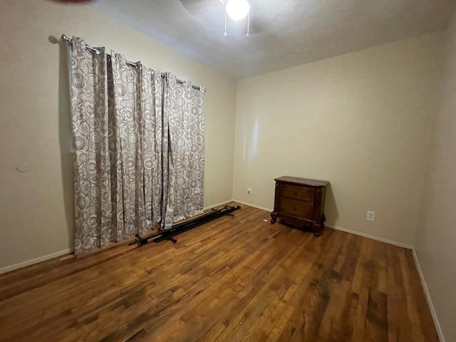 spare room featuring hardwood / wood-style floors