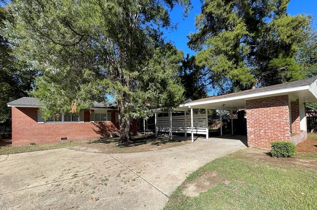 view of front of house featuring a carport