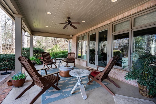 view of patio featuring ceiling fan and french doors