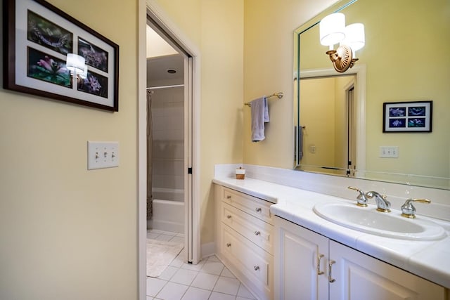 bathroom featuring vanity, shower / bath combo, and tile patterned floors