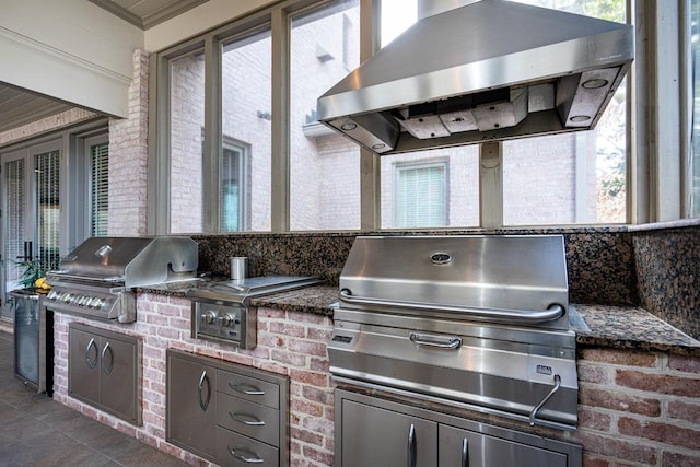 view of patio featuring an outdoor kitchen and area for grilling