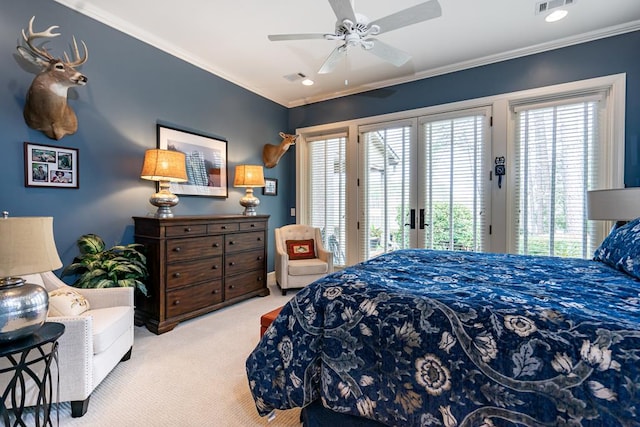 carpeted bedroom featuring access to outside, ornamental molding, and ceiling fan