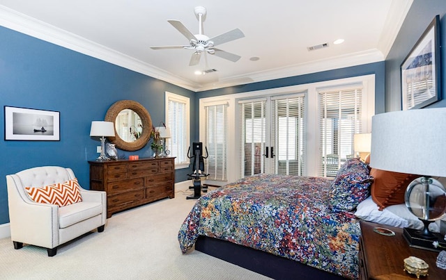 carpeted bedroom featuring ornamental molding and ceiling fan