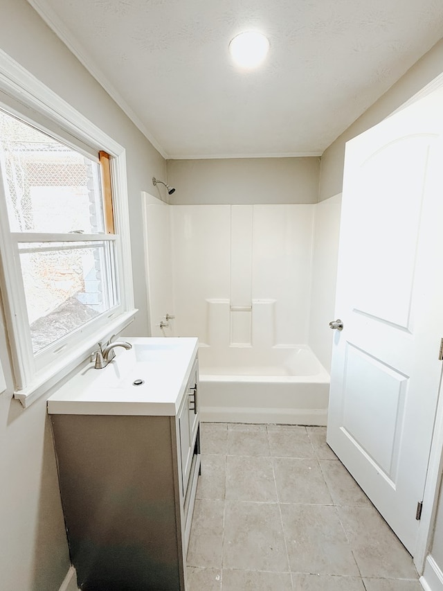 full bath with tile patterned flooring, vanity, and bathtub / shower combination