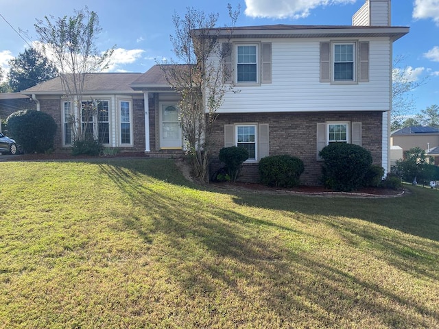 view of front of house with a front yard