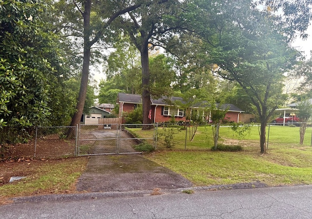 4212 Canady St, Columbus, GA 31909 - ranch-style home with asphalt driveway, a gate, and brick siding
