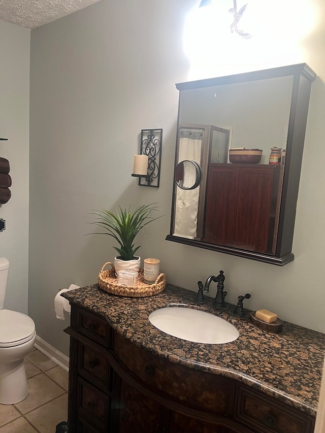 4212 Canady St, Columbus, GA 31909 - half bath with toilet, vanity, and tile patterned flooring