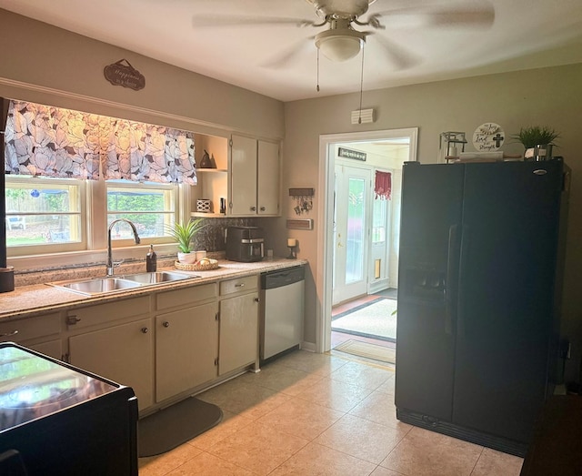 4212 Canady St, Columbus, GA 31909 - kitchen with black appliances, a sink, a ceiling fan, open shelves, and light countertops