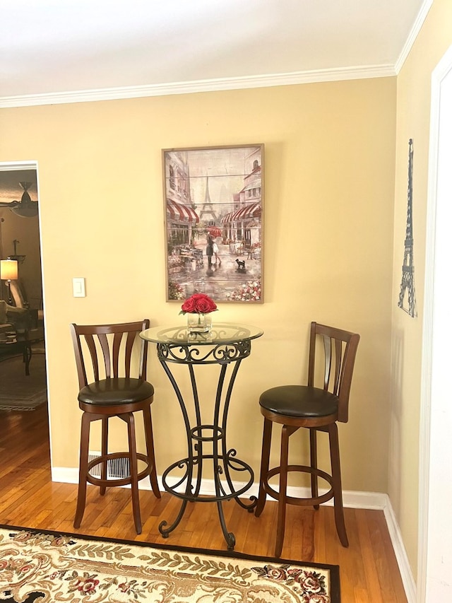4212 Canady St, Columbus, GA 31909 - dining area featuring wood finished floors, crown molding, and baseboards
