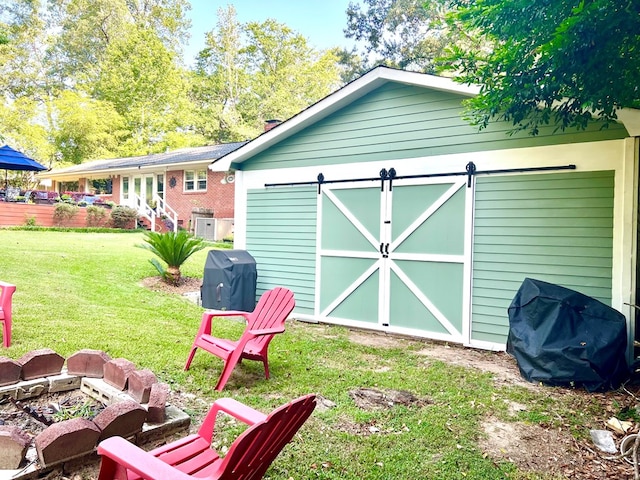 4212 Canady St, Columbus, GA 31909 - view of outbuilding with an outdoor fire pit