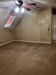 bonus room featuring ceiling fan, lofted ceiling, and carpet floors