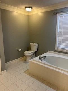 bathroom featuring ornamental molding, tiled bath, tile patterned floors, and toilet