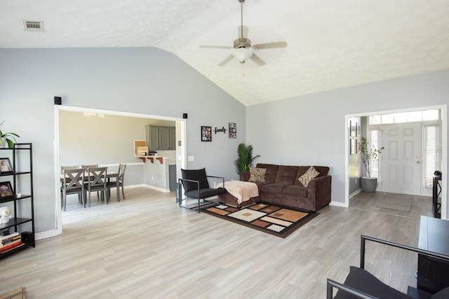 6074 White Pine Dr, Midland, GA 31820 - living room with a ceiling fan, lofted ceiling, and light wood finished floors