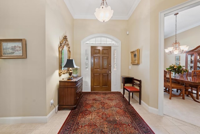 9011 Travelers Way, Midland, GA 31820 - foyer featuring a chandelier, light tile patterned floors, ornamental molding, baseboards, and a towering ceiling