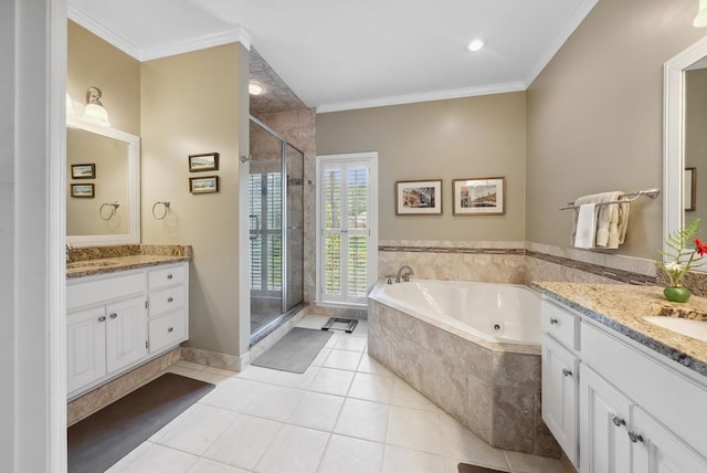 9011 Travelers Way, Midland, GA 31820 - bathroom with vanity, a jetted tub, a shower stall, ornamental molding, and tile patterned floors