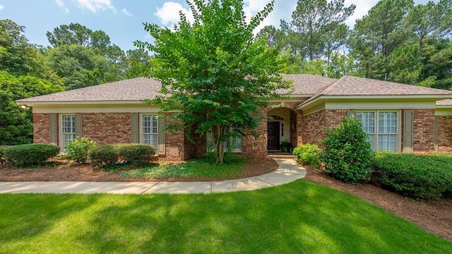 9011 Travelers Way, Midland, GA 31820 - view of front facade with a front lawn and brick siding