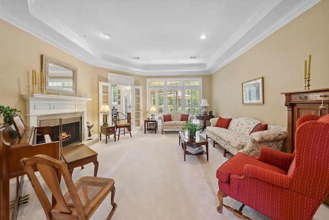 9011 Travelers Way, Midland, GA 31820 - carpeted living room with a raised ceiling, crown molding, and a warm lit fireplace