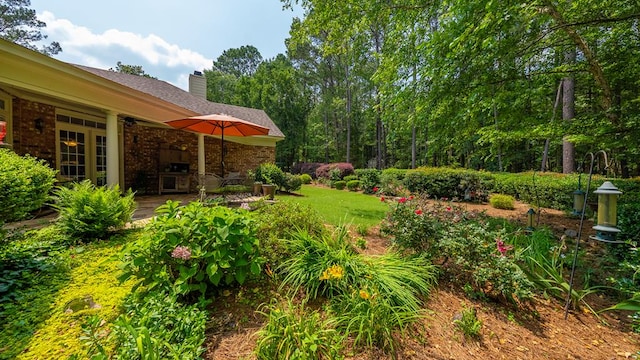 9011 Travelers Way, Midland, GA 31820 - view of yard featuring a patio