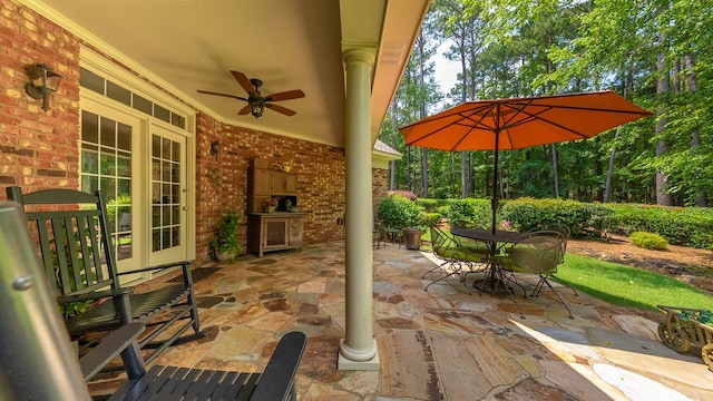 9011 Travelers Way, Midland, GA 31820 - view of patio with ceiling fan, outdoor dining area, and a fireplace