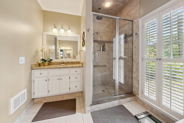 9011 Travelers Way, Midland, GA 31820 - bathroom with a shower stall, vanity, a baseboard heating unit, tile patterned flooring, and crown molding