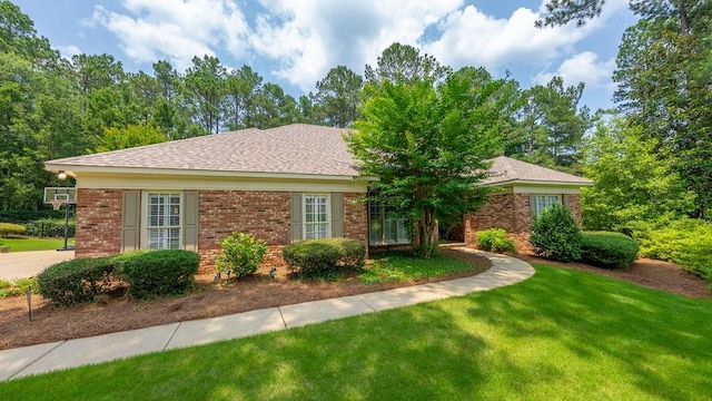 9011 Travelers Way, Midland, GA 31820 - view of front of house with a front lawn and brick siding