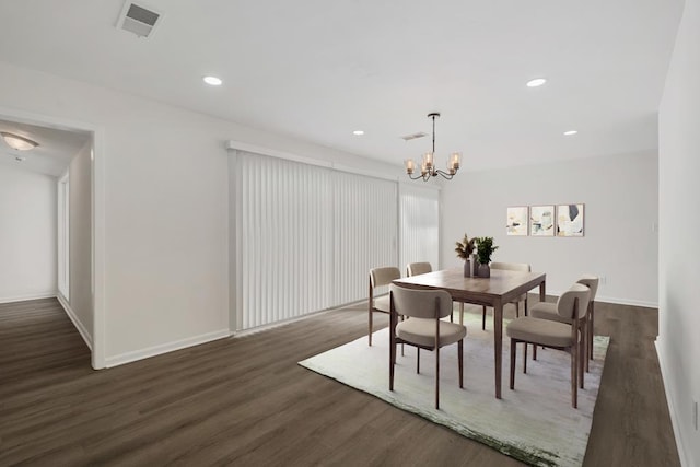 dining area featuring visible vents, recessed lighting, and dark wood-type flooring