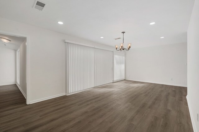 unfurnished living room featuring brick wall, light wood-style flooring, a brick fireplace, and visible vents