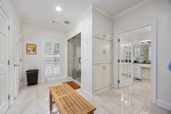 219 Broken Rock Rd, Hamilton, GA 31811 - corridor featuring light tile patterned floors, ornamental molding, and recessed lighting