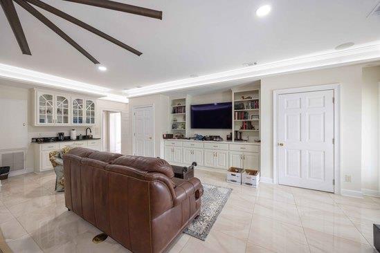 219 Broken Rock Rd, Hamilton, GA 31811 - living room with recessed lighting and built in shelves