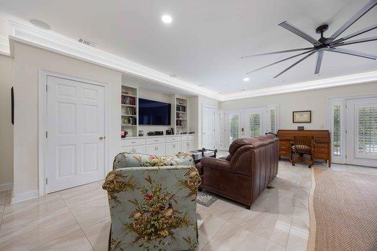219 Broken Rock Rd, Hamilton, GA 31811 - living area with ornamental molding, a ceiling fan, and recessed lighting