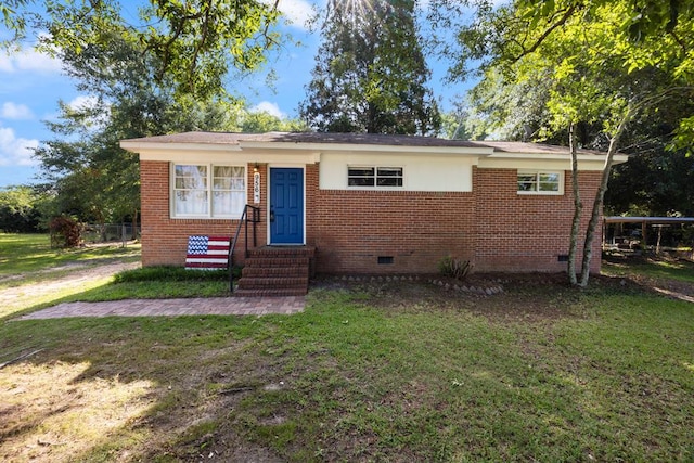 956 Lake Rushin Dr, Columbus, GA 31907 - view of front facade with entry steps, crawl space, a front yard, and brick siding