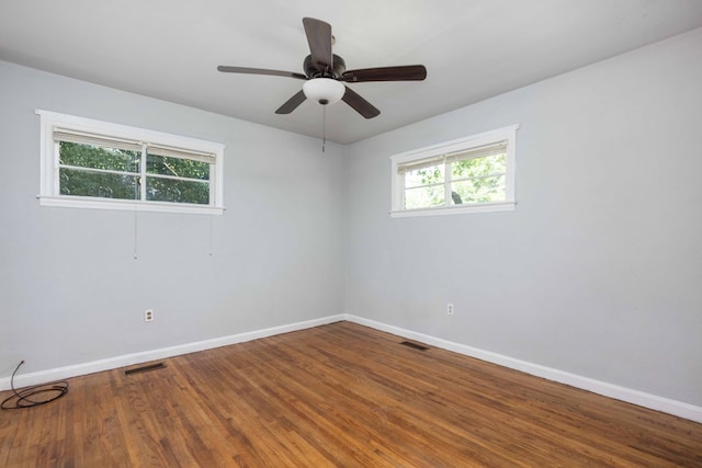 956 Lake Rushin Dr, Columbus, GA 31907 - unfurnished room with plenty of natural light, wood finished floors, and a ceiling fan