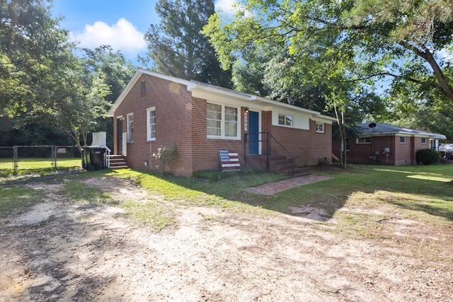 956 Lake Rushin Dr, Columbus, GA 31907 - bungalow-style house with brick siding, driveway, a gate, and crawl space