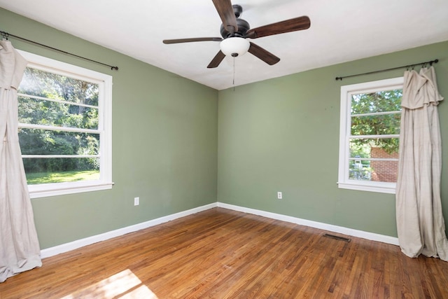 956 Lake Rushin Dr, Columbus, GA 31907 - spare room with plenty of natural light, wood finished floors, and ceiling fan