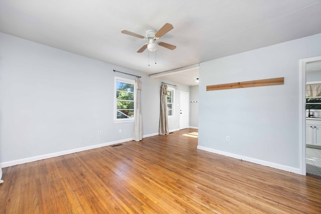 956 Lake Rushin Dr, Columbus, GA 31907 - empty room with ceiling fan and light wood finished floors