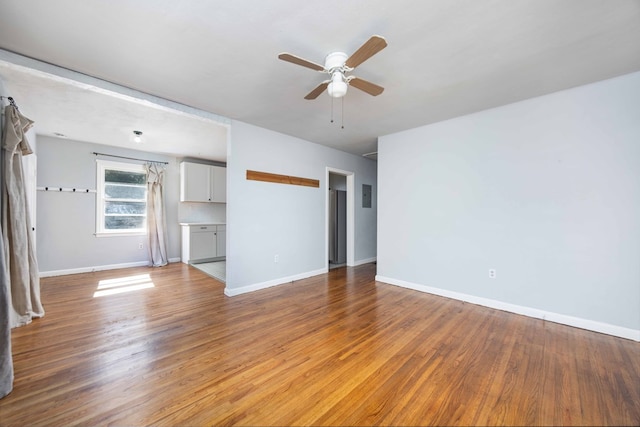 956 Lake Rushin Dr, Columbus, GA 31907 - unfurnished living room with ceiling fan and light wood-type flooring