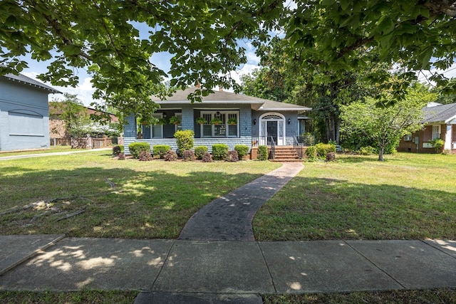 view of front of home featuring a front yard