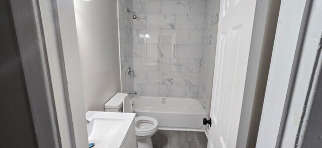 3315 Urban Ave, Columbus, GA 31907 - bathroom featuring bathing tub / shower combination and wood finished floors