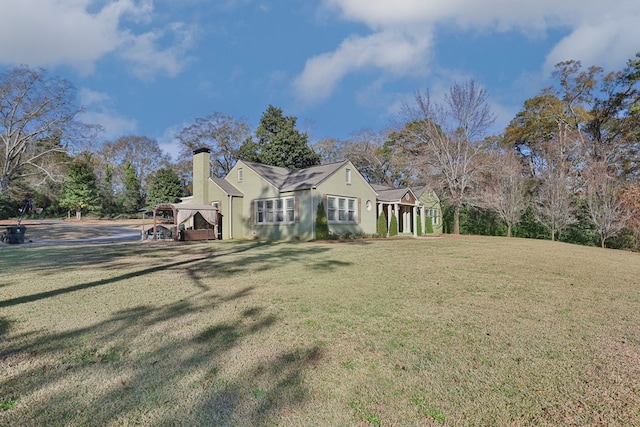 view of home's exterior featuring a lawn