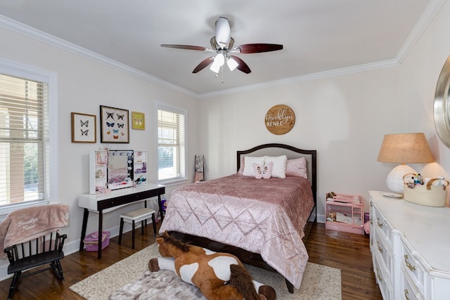 bedroom featuring dark hardwood / wood-style flooring, ceiling fan, and crown molding