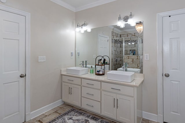 bathroom with vanity, a shower with door, and ornamental molding