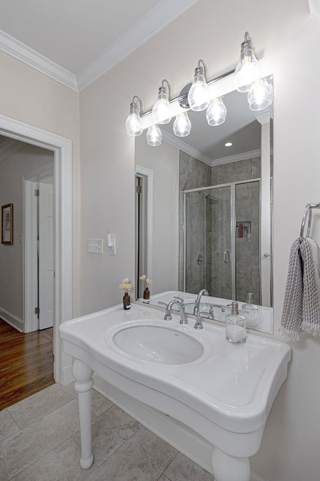 bathroom featuring tile patterned flooring, walk in shower, and crown molding