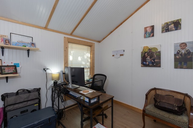 office area featuring hardwood / wood-style flooring and lofted ceiling