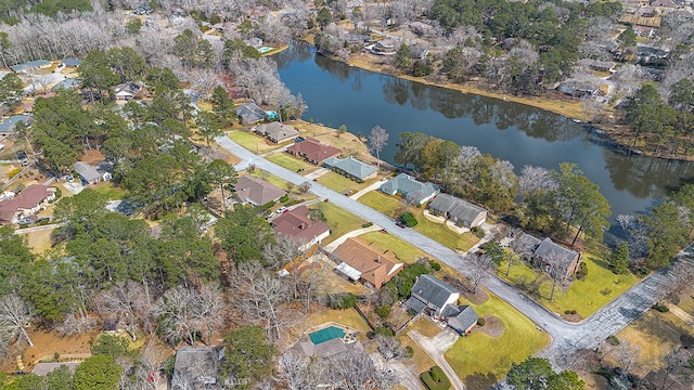 birds eye view of property featuring a residential view and a water view