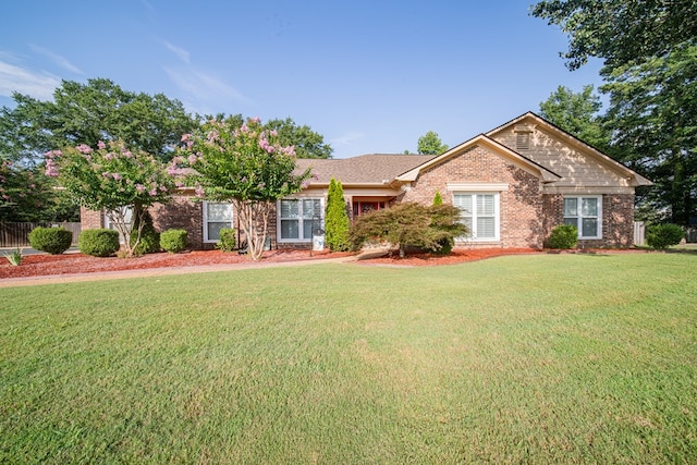 5 Mallard Ct, Midland, GA 31820 - ranch-style home with a front yard and brick siding