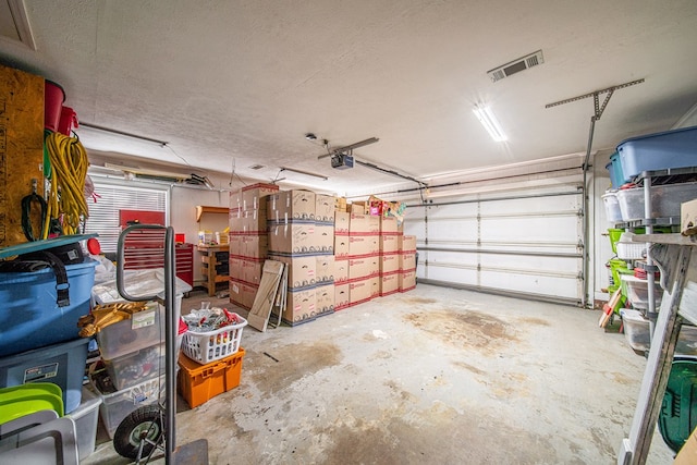 5 Mallard Ct, Midland, GA 31820 - garage featuring a garage door opener