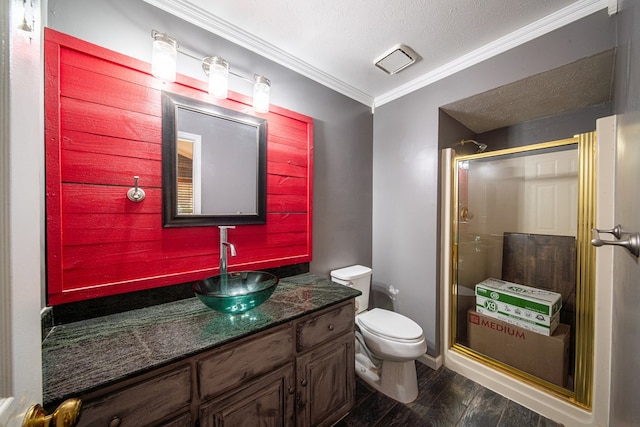 5 Mallard Ct, Midland, GA 31820 - bathroom featuring crown molding, a shower stall, vanity, wood finished floors, and a textured ceiling