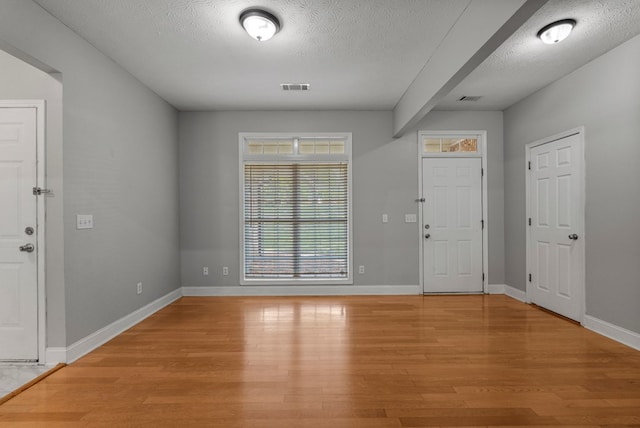240 Lee Road 2099, Phenix City, AL 36870 - foyer entrance featuring light wood-style flooring, baseboards, and a textured ceiling