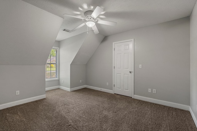 240 Lee Road 2099, Phenix City, AL 36870 - bonus room featuring carpet floors, ceiling fan, lofted ceiling, baseboards, and a textured ceiling